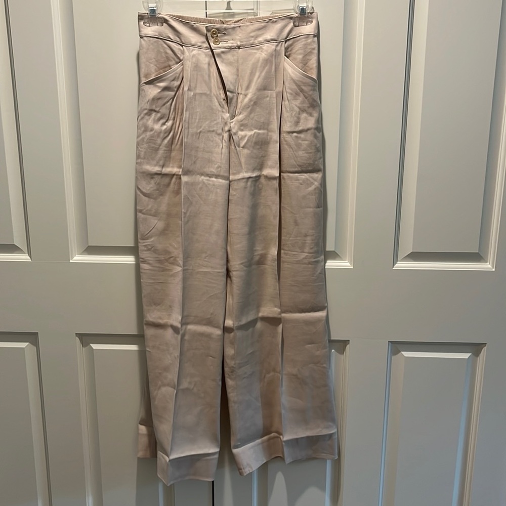 Brand new Cabi pants. Traipse style. Size 4. Biscotti color.